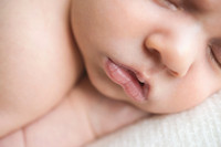 Close up detailed photograph of a newborn babies lips