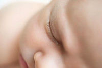 Close up detailed photo of a babies eye lashes